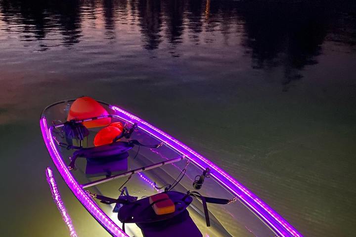 a small boat in a body of water