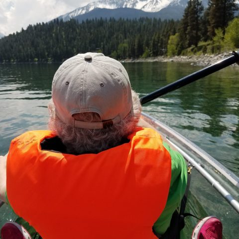 a boat sitting on top of a mountain