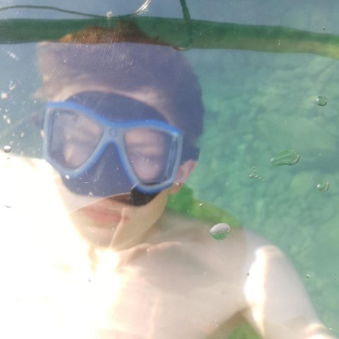 a man swimming in the water