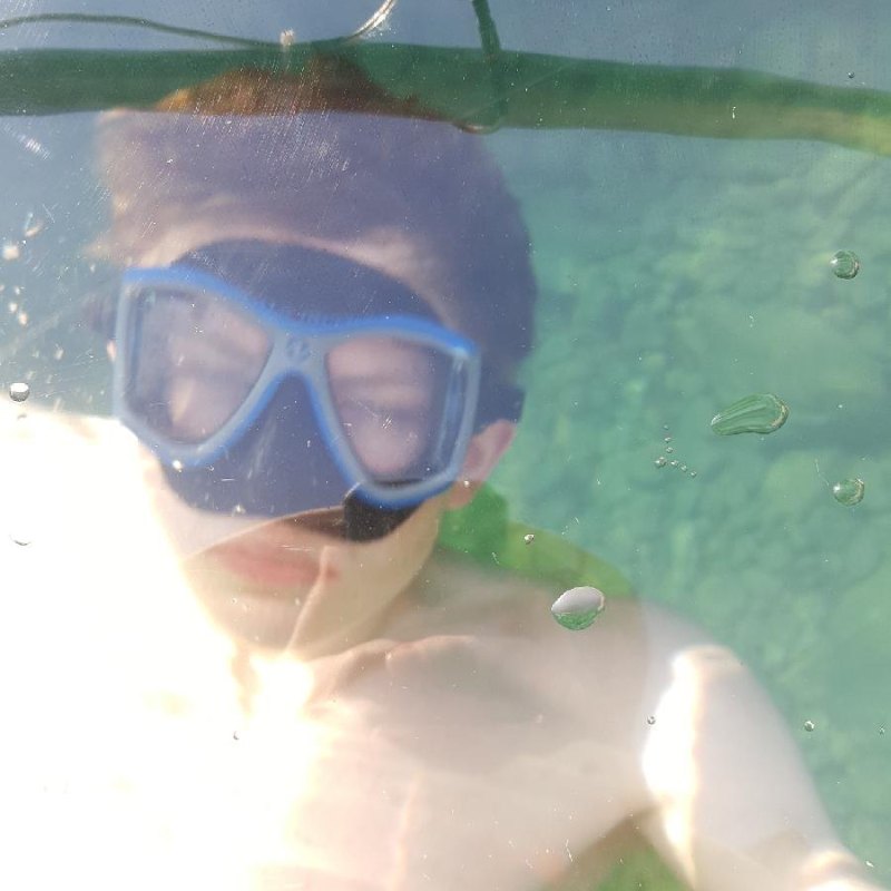 a man swimming in the water