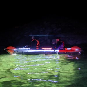 a small boat in a body of water