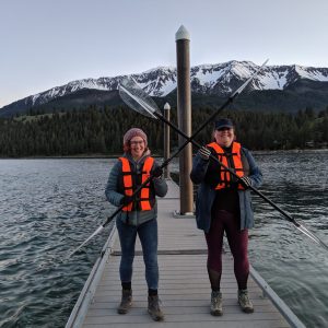 crossing paddles on a dock